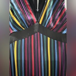 Party wear long and elegant dress. Size 8, BCBG multi color dress. NEW.